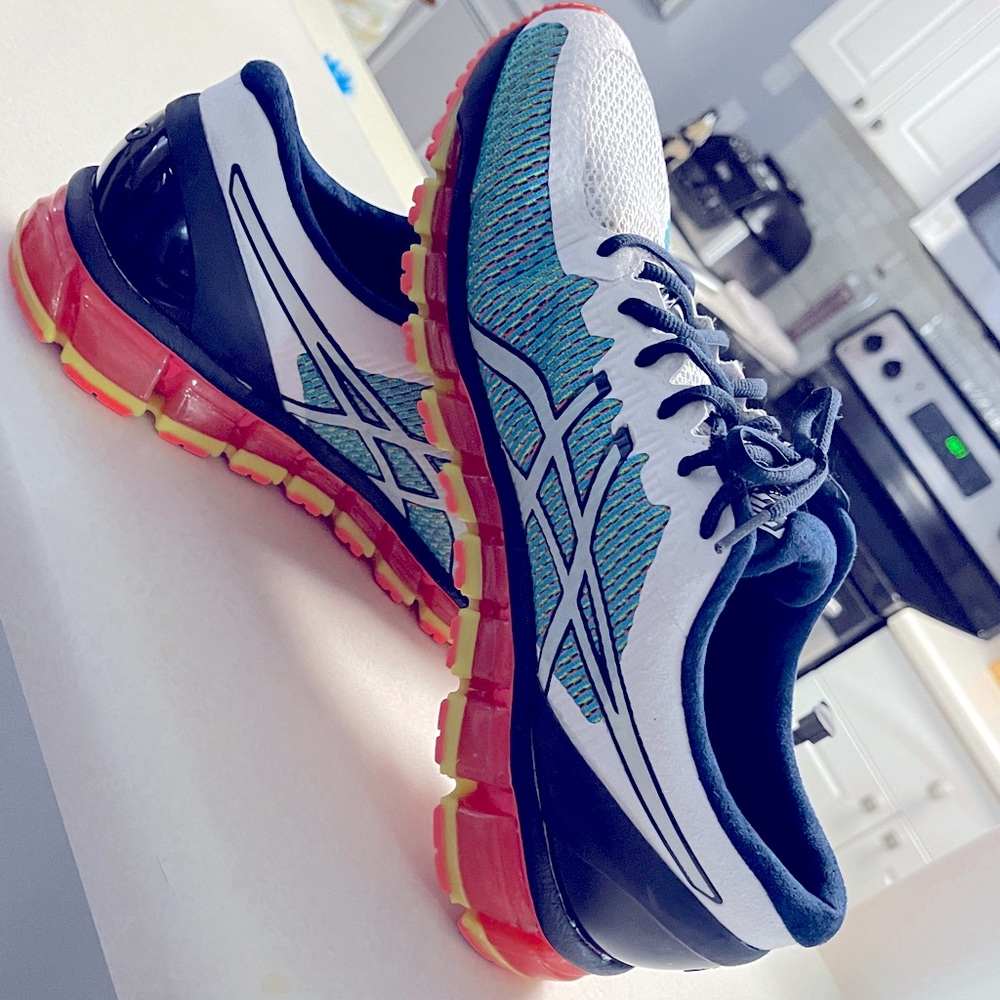 Multi -color ASICS tennis shoes , these are great condition.